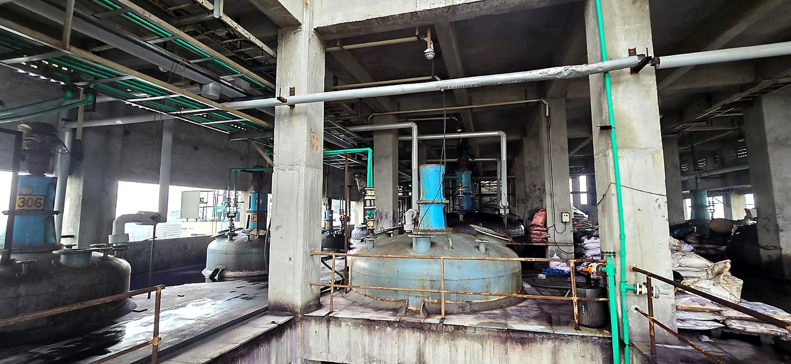 Reaction vessels on the production floor at Yobai Industries